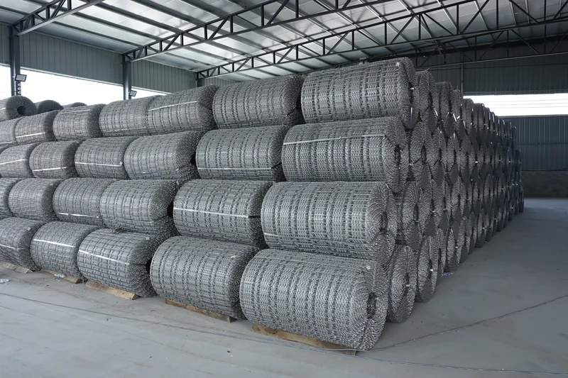 Neatly stacked mesh rolls inside the factory